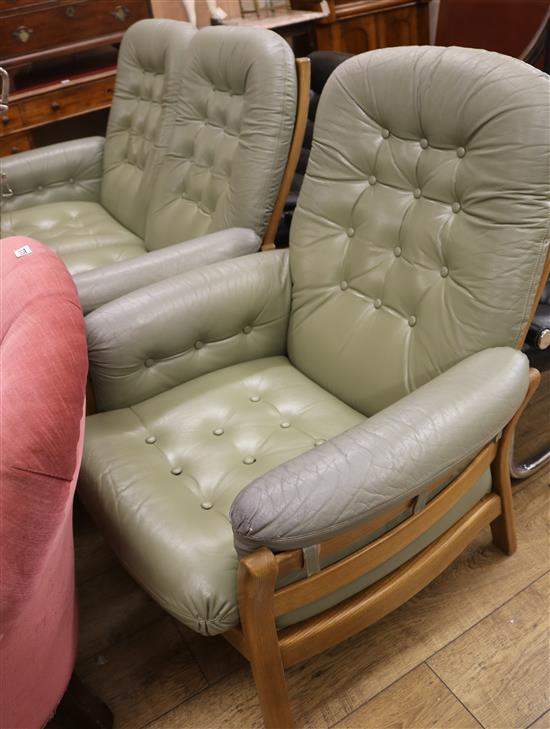 An Ercol sofa and chair, W.130cm